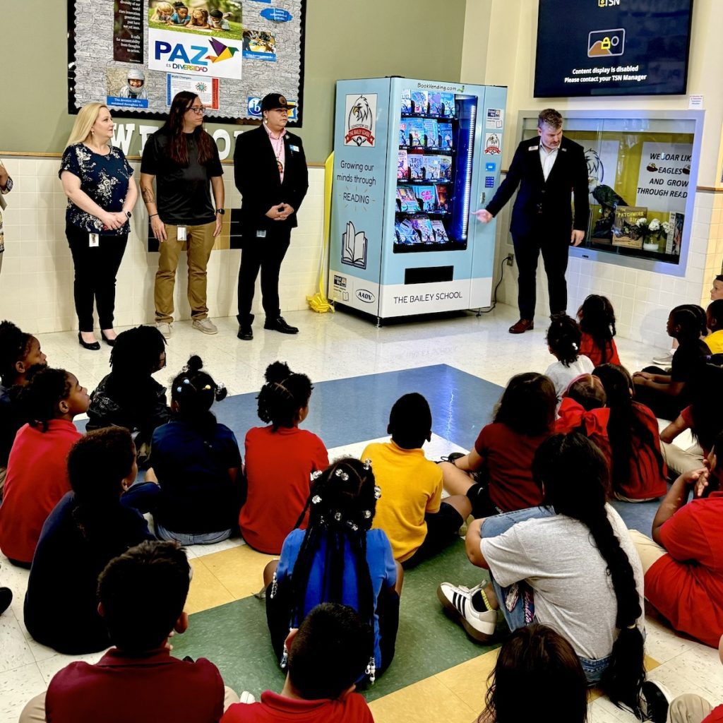 Reading is fundamental: AAON sponsors book vending machine for Bailey Elementary School